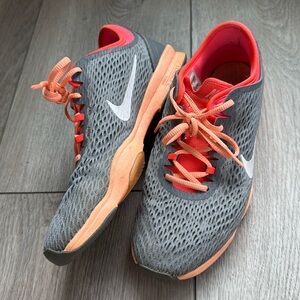 Nike training zoom fit tennis shoes neon orange and gray